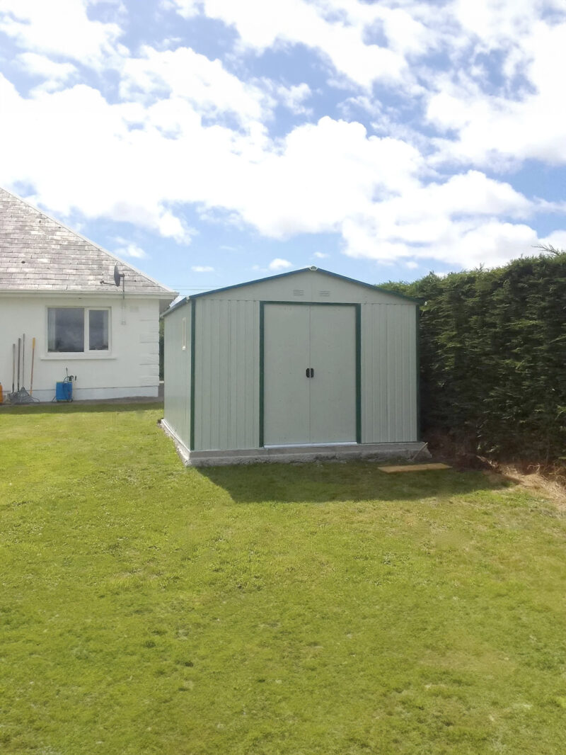 The Off-White Colossus shed in a garden in Co. Kerry