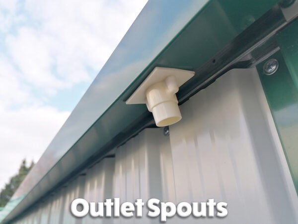 Outlet spouts attached to the gutters on this steel shed.
