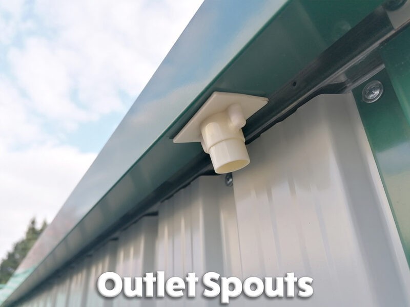 Outlet spouts attached to the gutters on this steel shed.