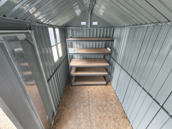 a wide angled view of the inside of the cottage shed as seen