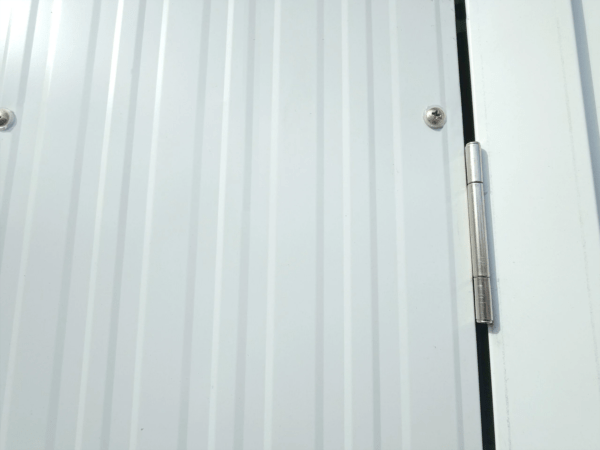 The hinges on the steel cottage sheds' doors