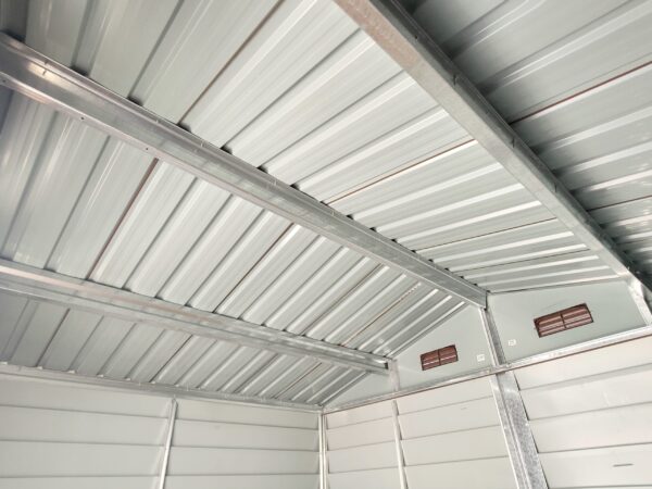 A view looking up at the roof of the budget woodgrain shed