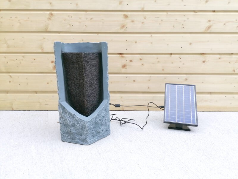 The Waterfall Water Feature from Sheds Direct Ireland beside the solar panel