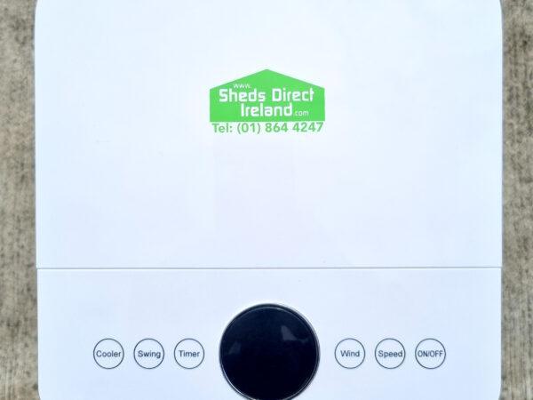 A birds eye view of the top of the air cooler. The black circle is prominent at the bottom and the green sheds direct Ireland logo is visible at the top