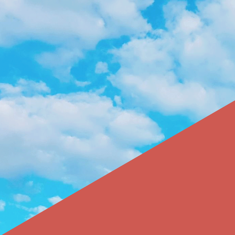A gif of a Shed on slope sliding from the top right to the bottom left of the frame. There is a bright blue cloud background