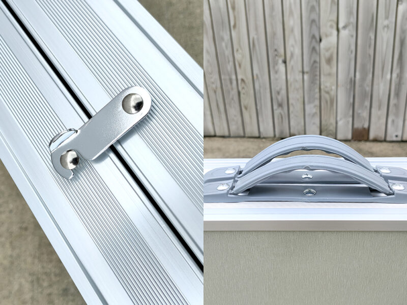 The locking mechanism and carry handle details on the picnic table