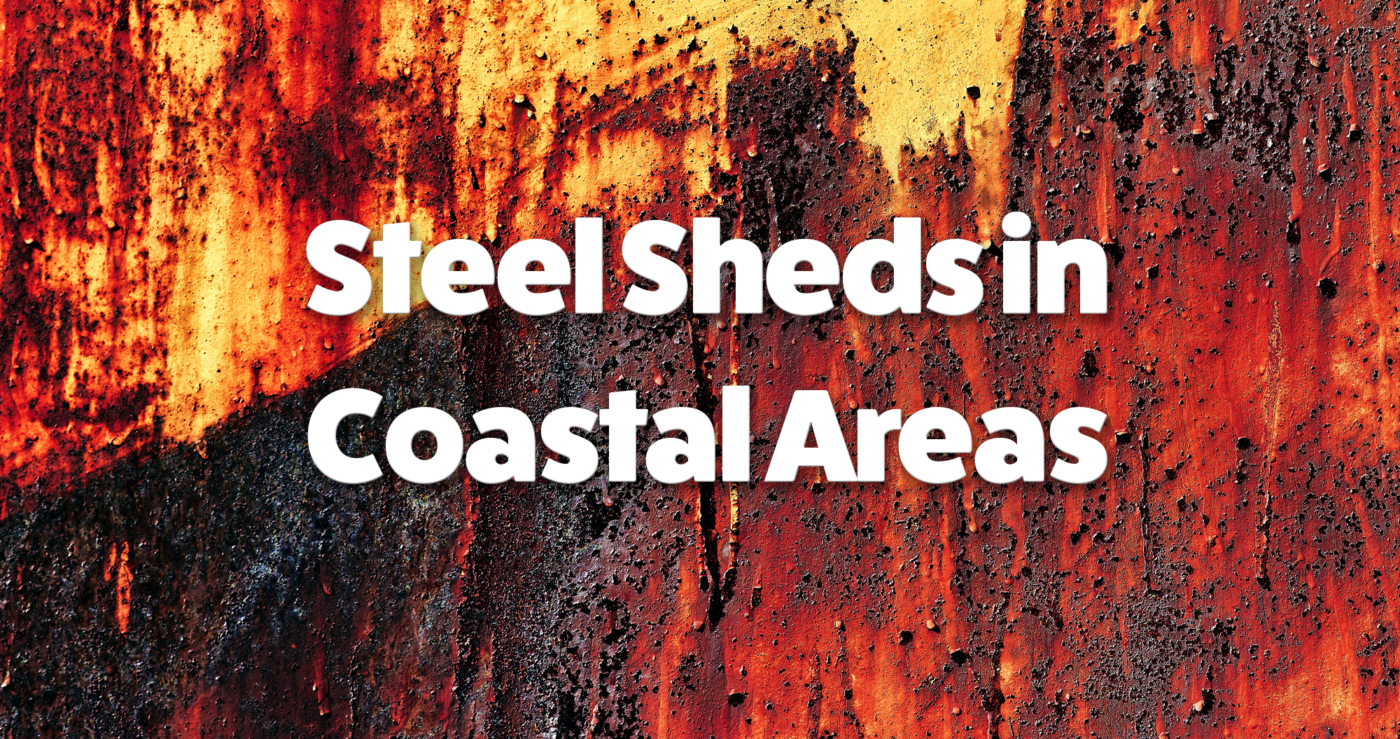 Steel sheds in coastal areas written on a red and orange rusted piece of metal