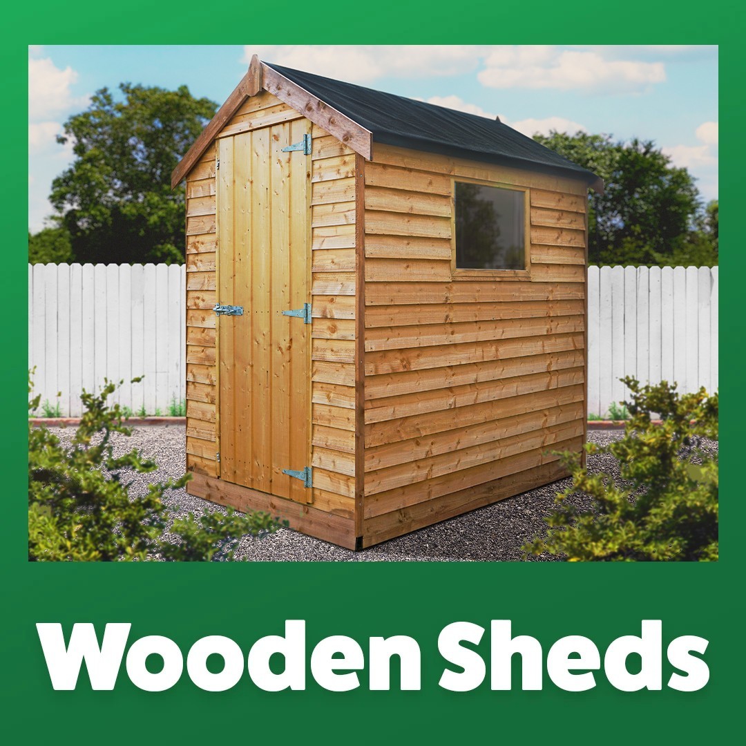 Wooden shed on green background