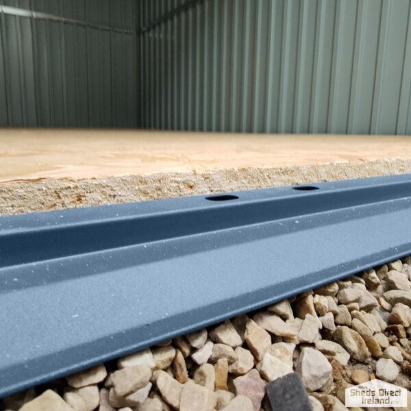 the floor railing of the big blu shed on the ground