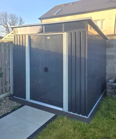 Steel Pent garden shed in a family garden in Meath