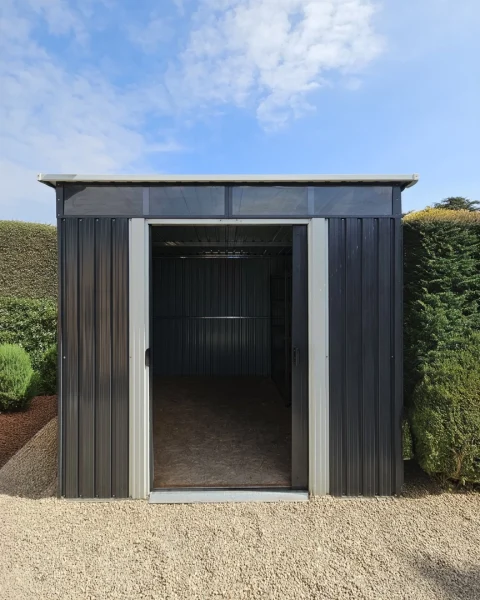 Steel Pent shed in a garden