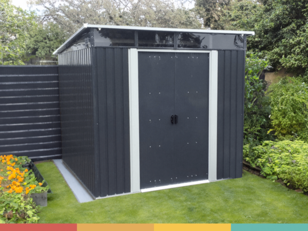 Steel Pent 8ft wide x 6ft deep garden shed in a green garden