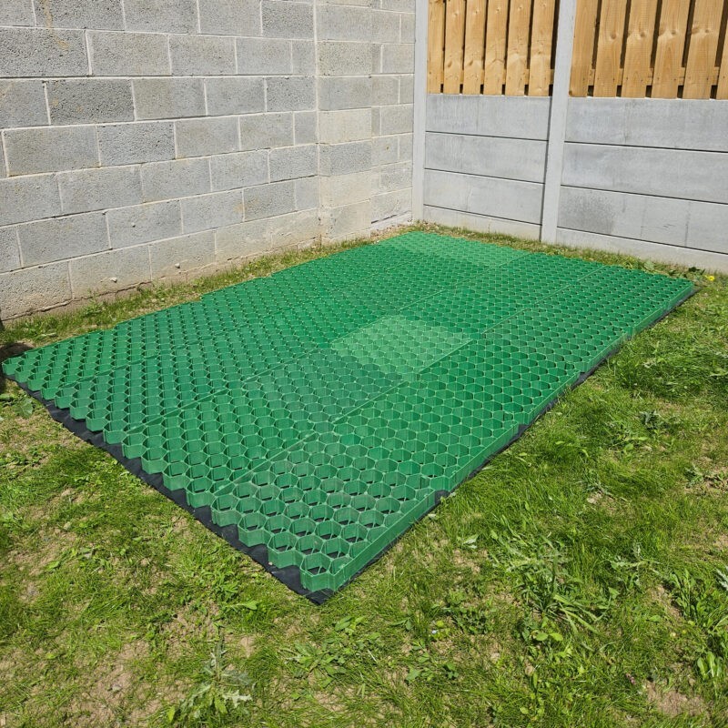 A Shed Base from Sheds Direct Ireland on a lawn