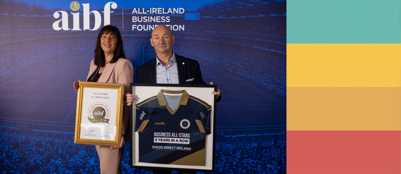 Alan and Louise accepting their awards from the AIBF