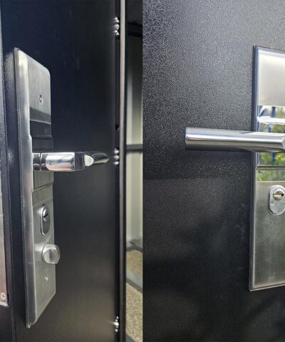 a detailed view of the handle and lock of the shed