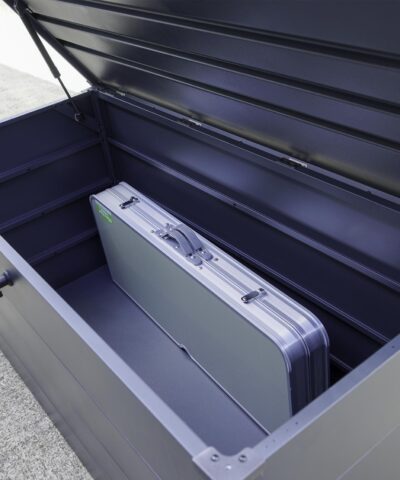 A fold downpicnic table stored inside the garden storage box