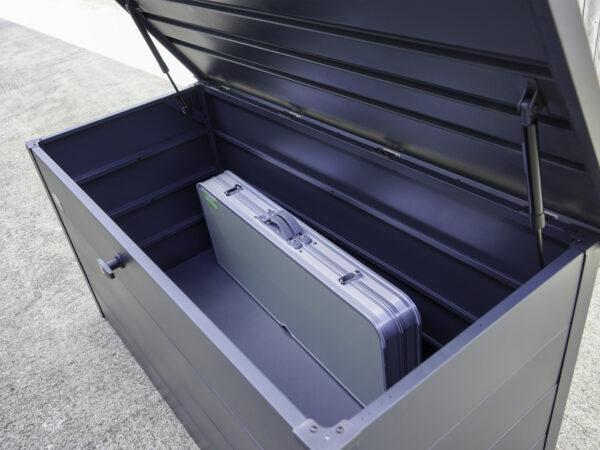 A fold downpicnic table stored inside the garden storage box