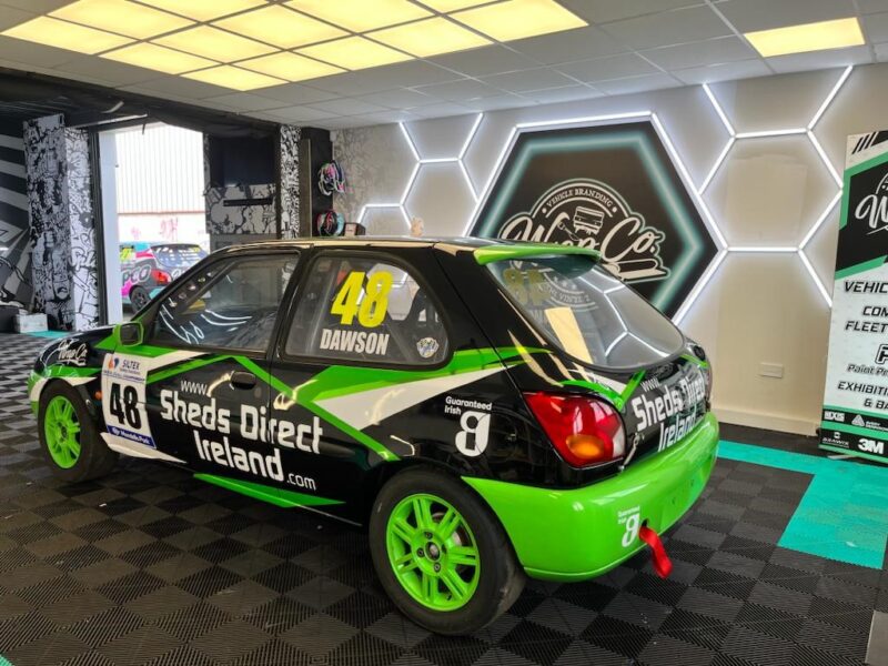 The Sheds Direct Ireland racing Ford Fiesta with the Guaranteed Irish logo on the side panel and read bumper