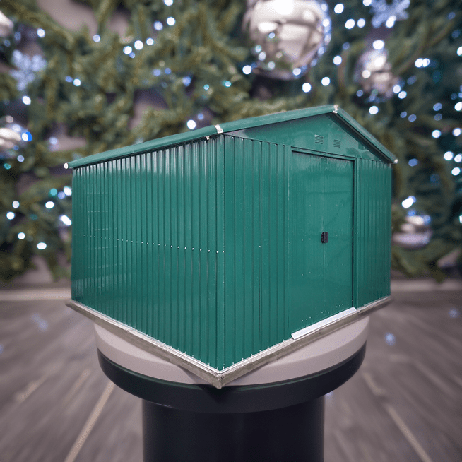 The Colossus Shed on a plinth in front of a Christmas Tree