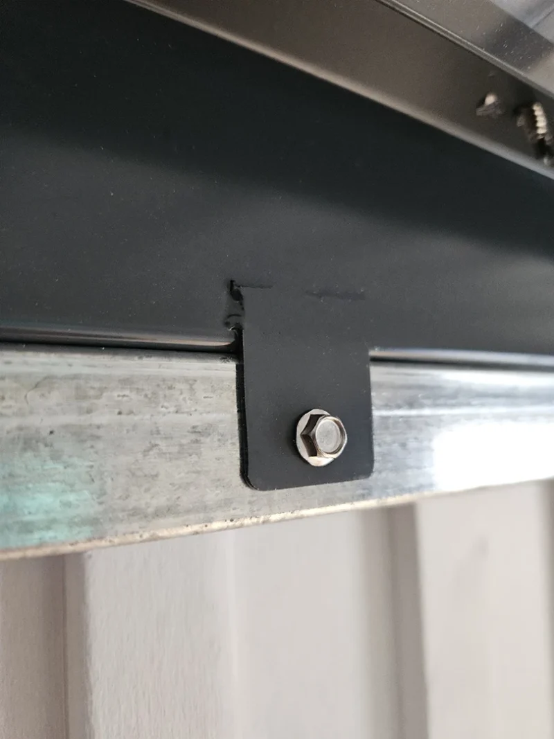 The bolts on the inside of the shed