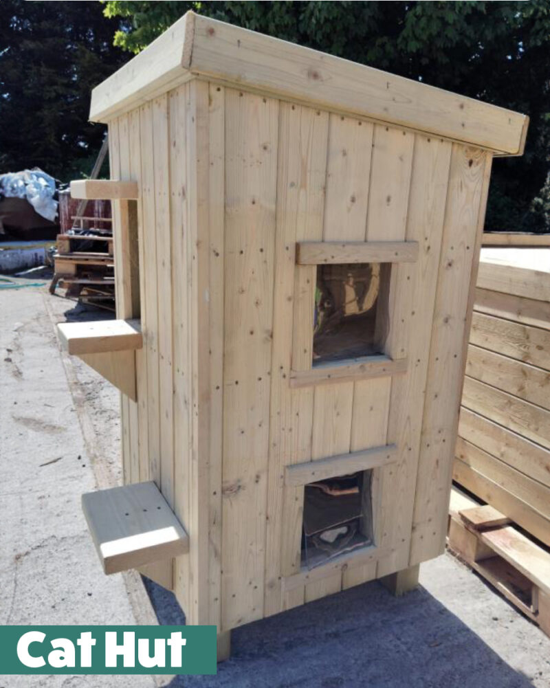 the windows on the side of the cat hut