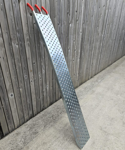 One of the ramps from the 400kg set against a wall