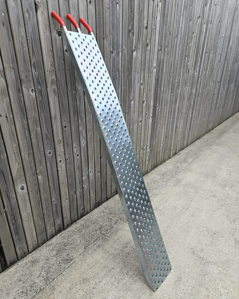 One of the ramps from the 400kg set against a wall