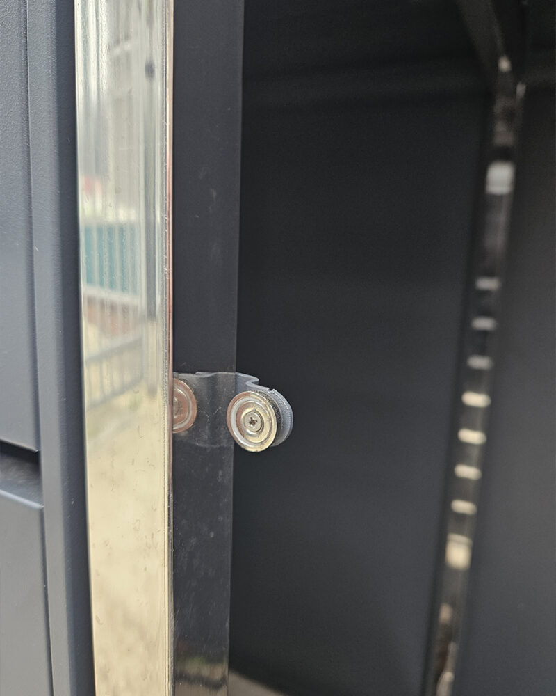 The magnetic catch on the bin store