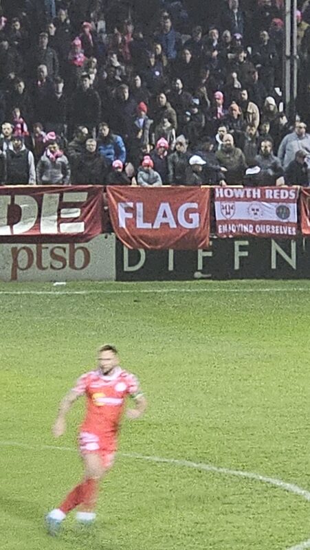 Flag that says 'FLAG' at Tolka Park for a Shelbourne Match