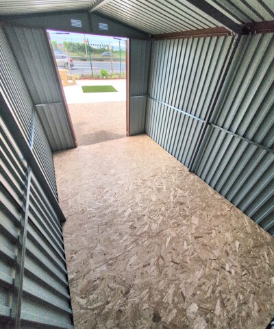 Interior of the premium woodgrain 8ft x 12ft steel shed, looking outwards