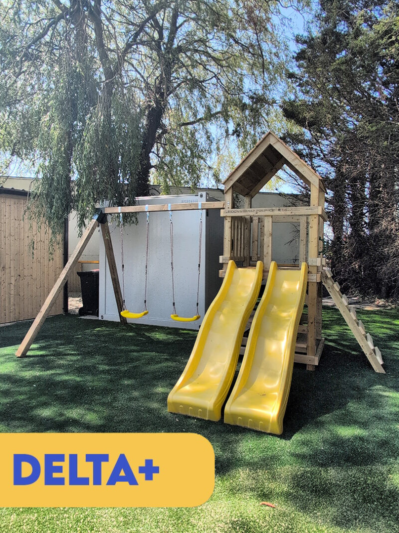 The Delta+ playhouse with a yellow slide
