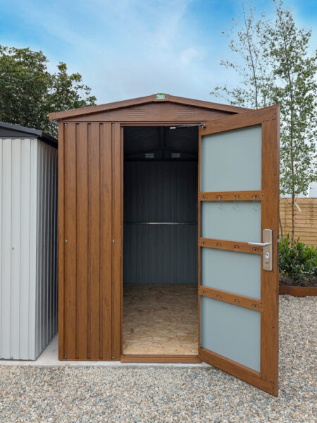The woodgrain shed with one door open