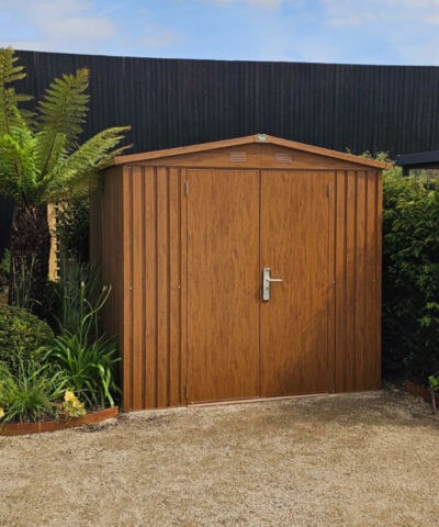 A front view of the premium woodgrain shed