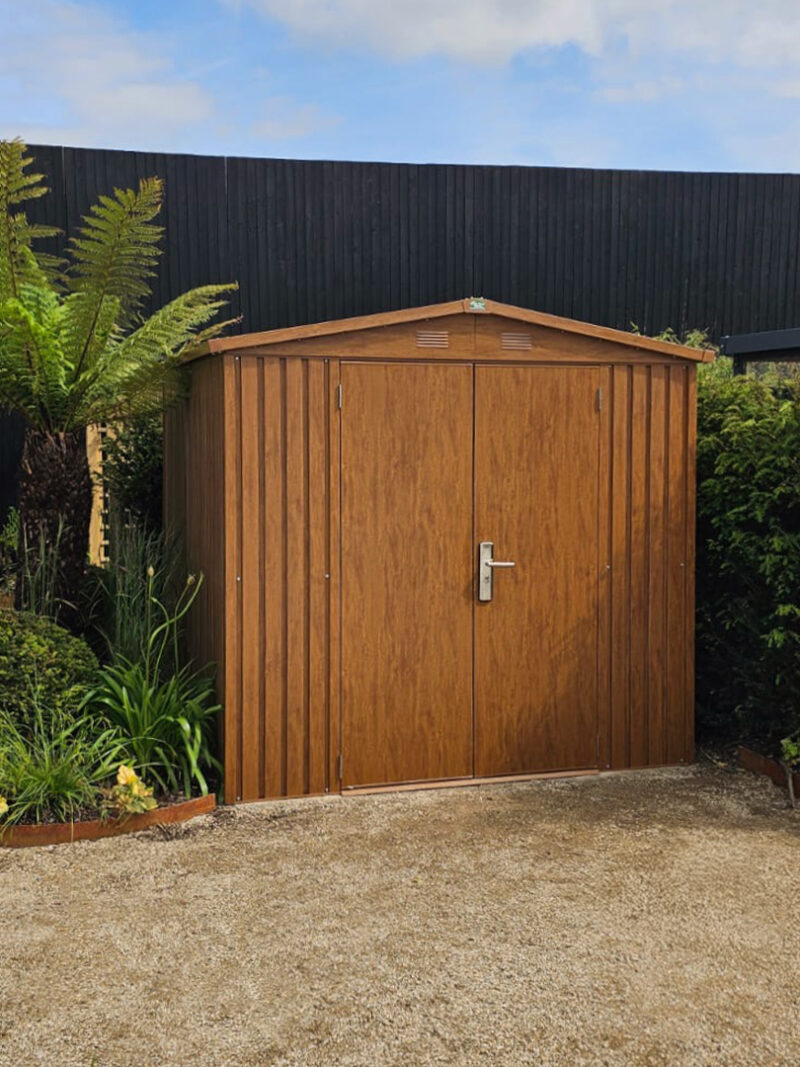 A front view of the premium woodgrain shed