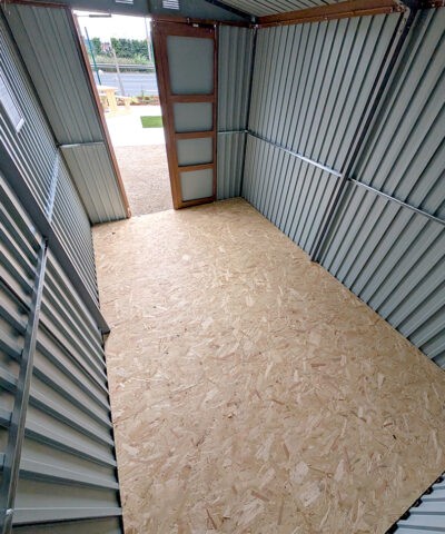 interior view looking to the door of the premium woodgrain shed