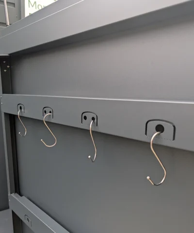 The tool hooks with s-hooks in them on the inside of the door