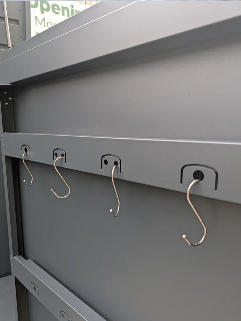 The tool hooks with s-hooks in them on the inside of the door