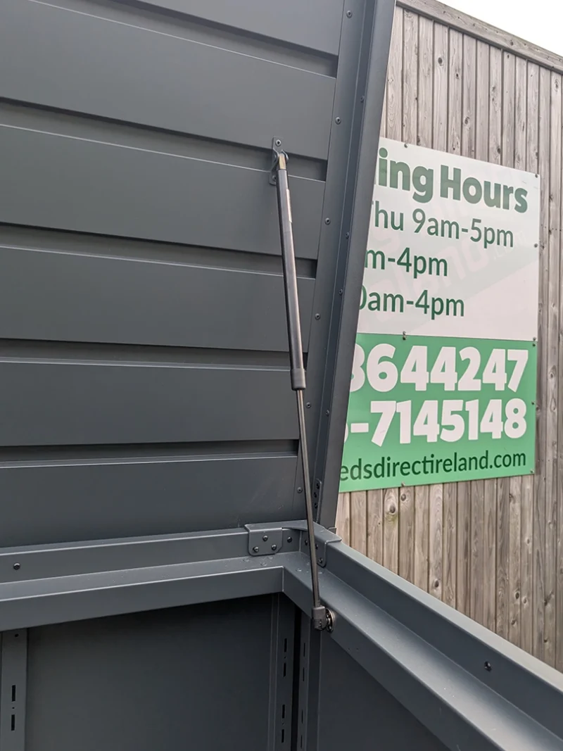 The gas-assist hinge on the top-opening of the outdoor storage box