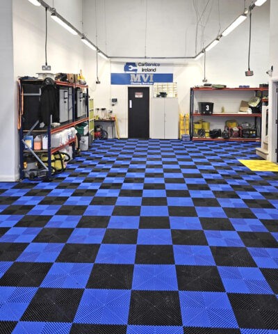 The Black and Blue A-Grip tiles in a Car Servicing company