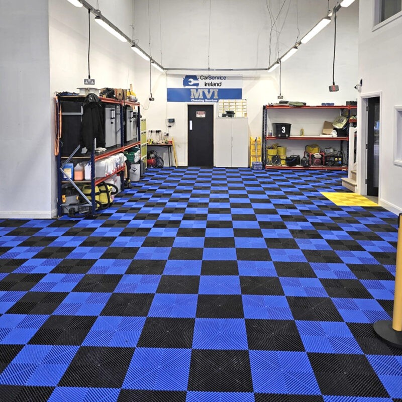The Black and Blue A-Grip tiles in a Car Servicing company