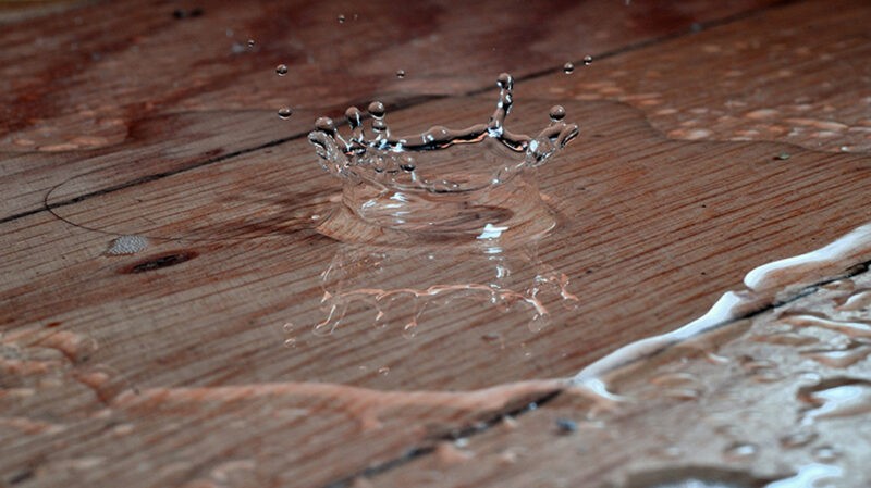Water drop on the surface of a wooden shed
