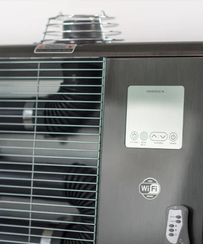 The remote control connected to the front of the heater