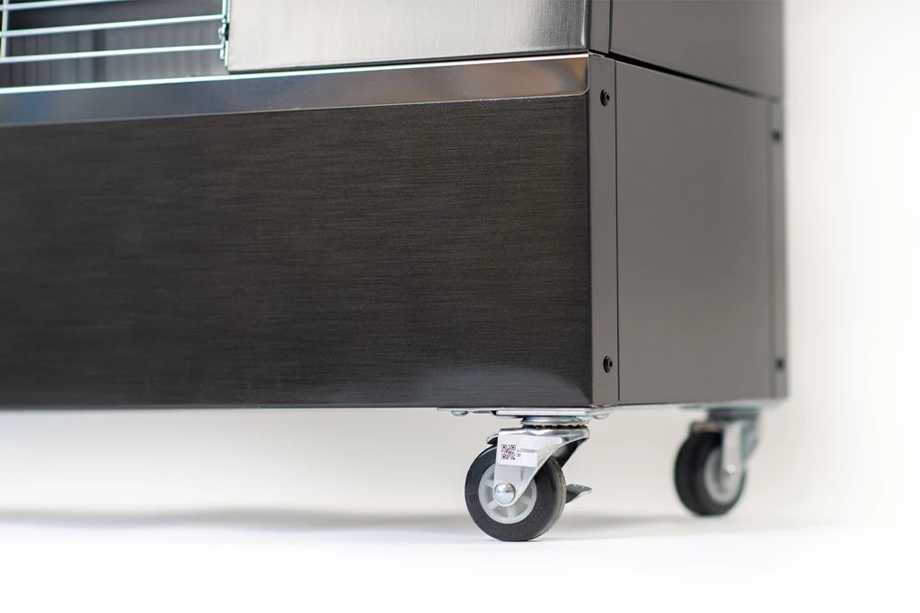 The caster wheels on the bottom of the machine